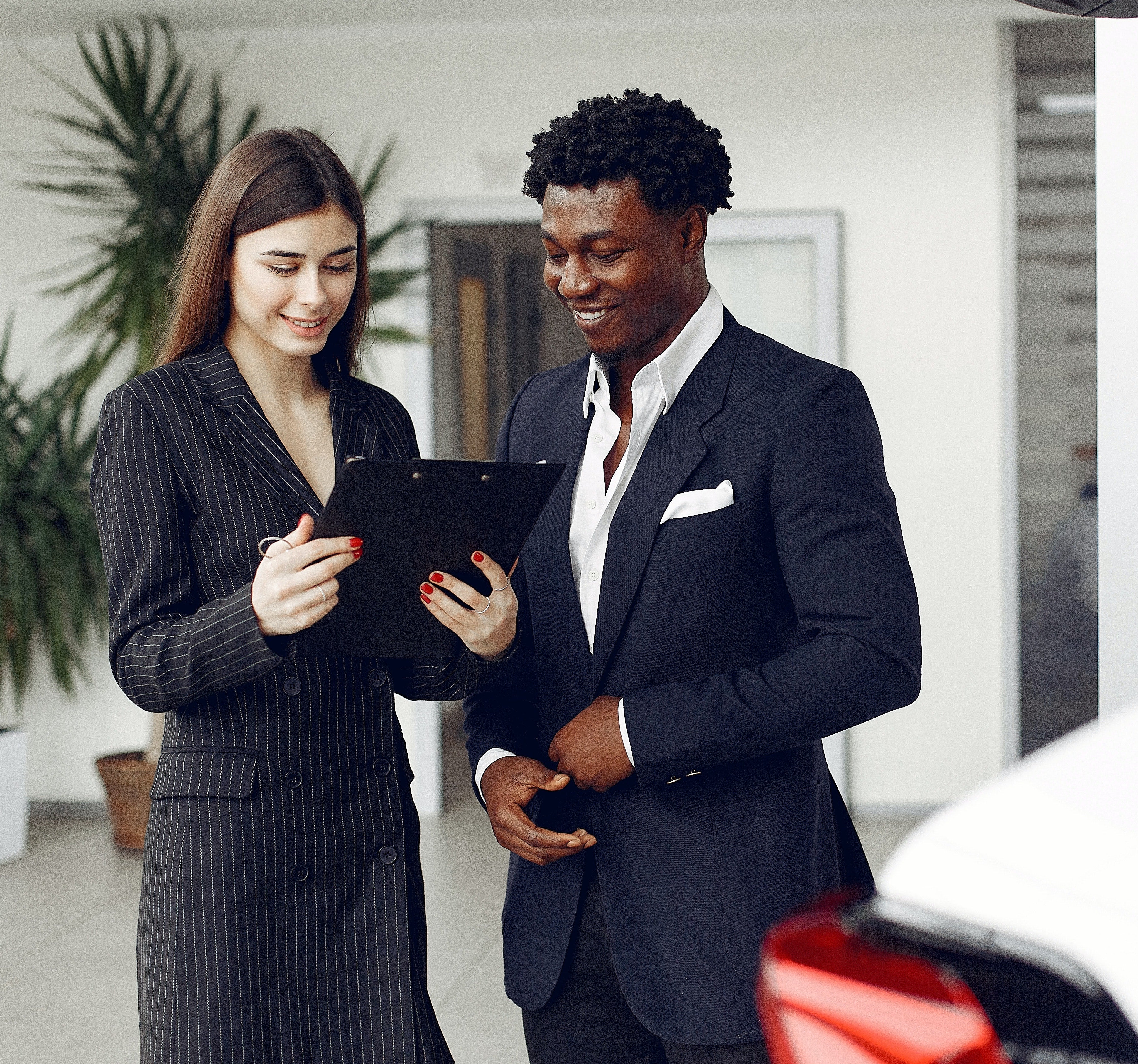 customer talking to sales specialist about purchasing a vehicle at chrysler of culpepper
